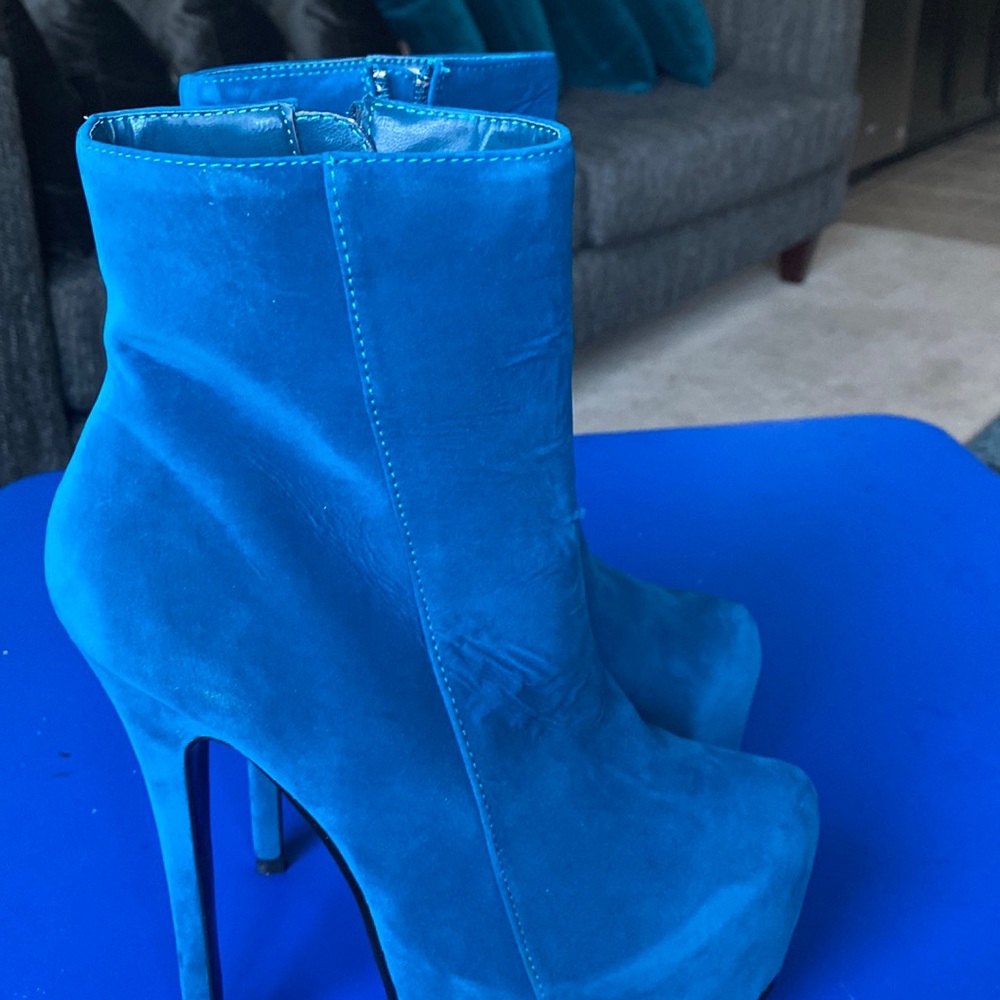 Beautiful ankle boots , never worn but has slight imperfection in the front